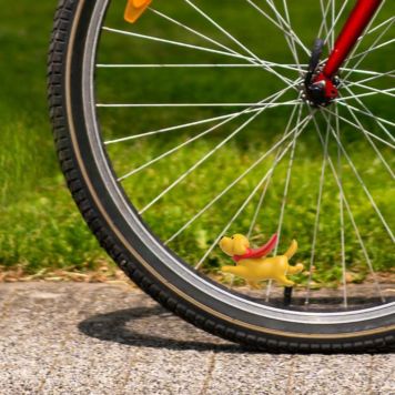 Cagnolino in bicicletta Henry